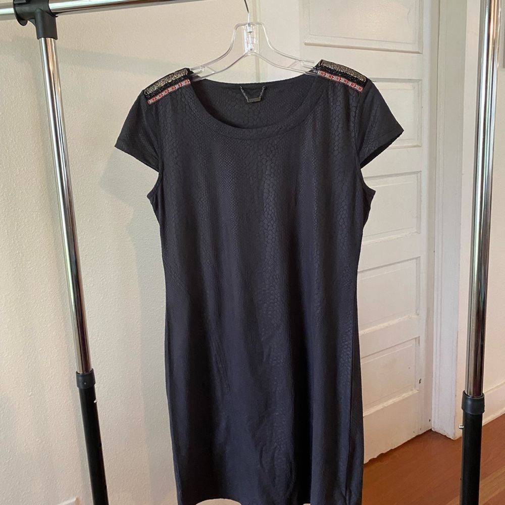 Elegant Black Dress with Embellished Shoulders